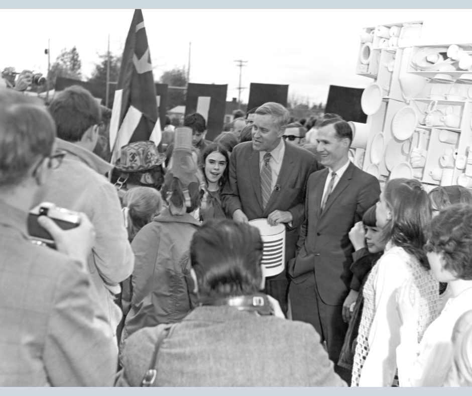 Governor Tom McCall in a crowd of people at an Earth Day Celebration.