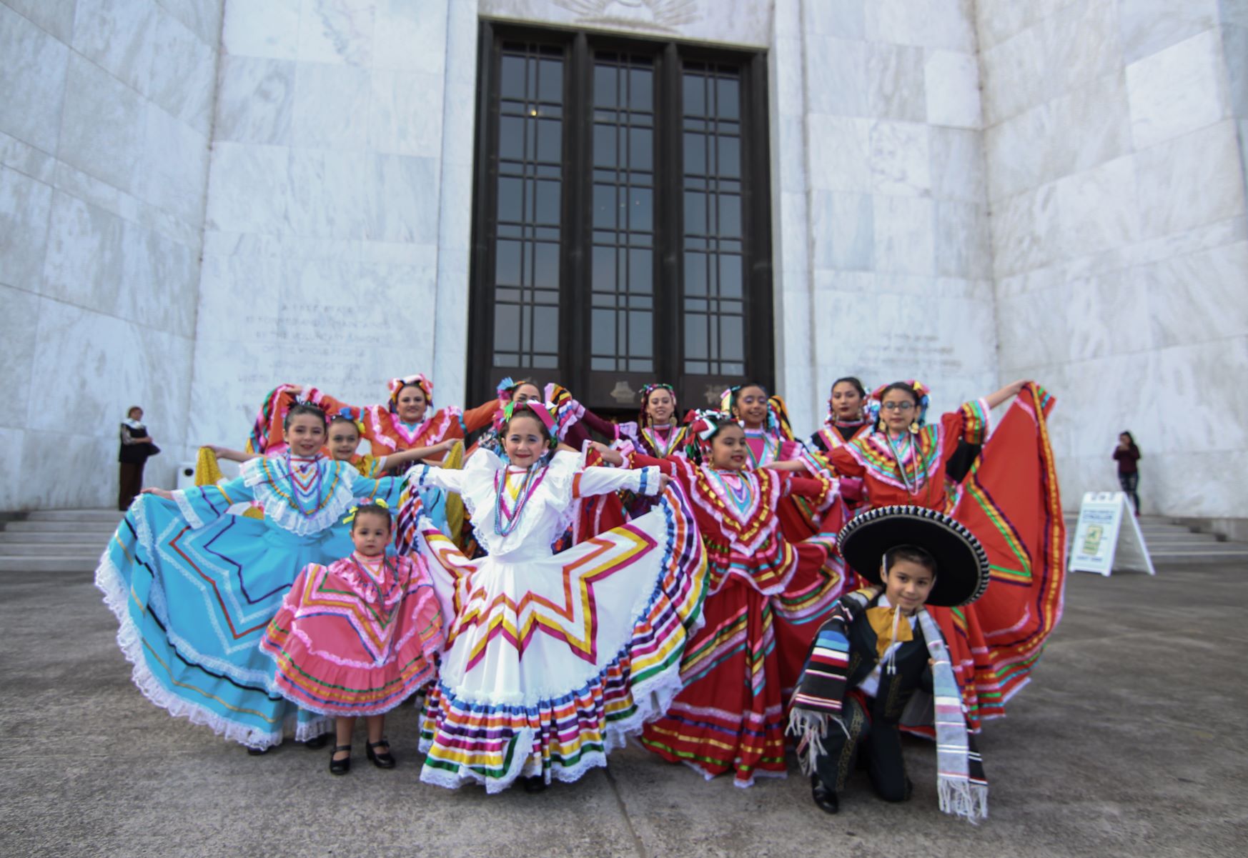 Ballet Folklorico Tlanese dancers pose on the front steps of the Capitol during Hispanic Heritage Day.